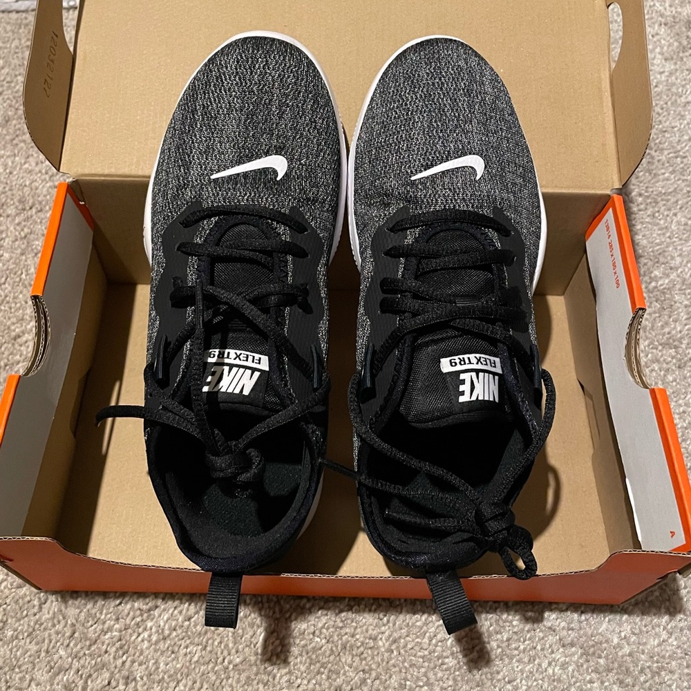 Heathered black Nike sneakers with metallic undertones